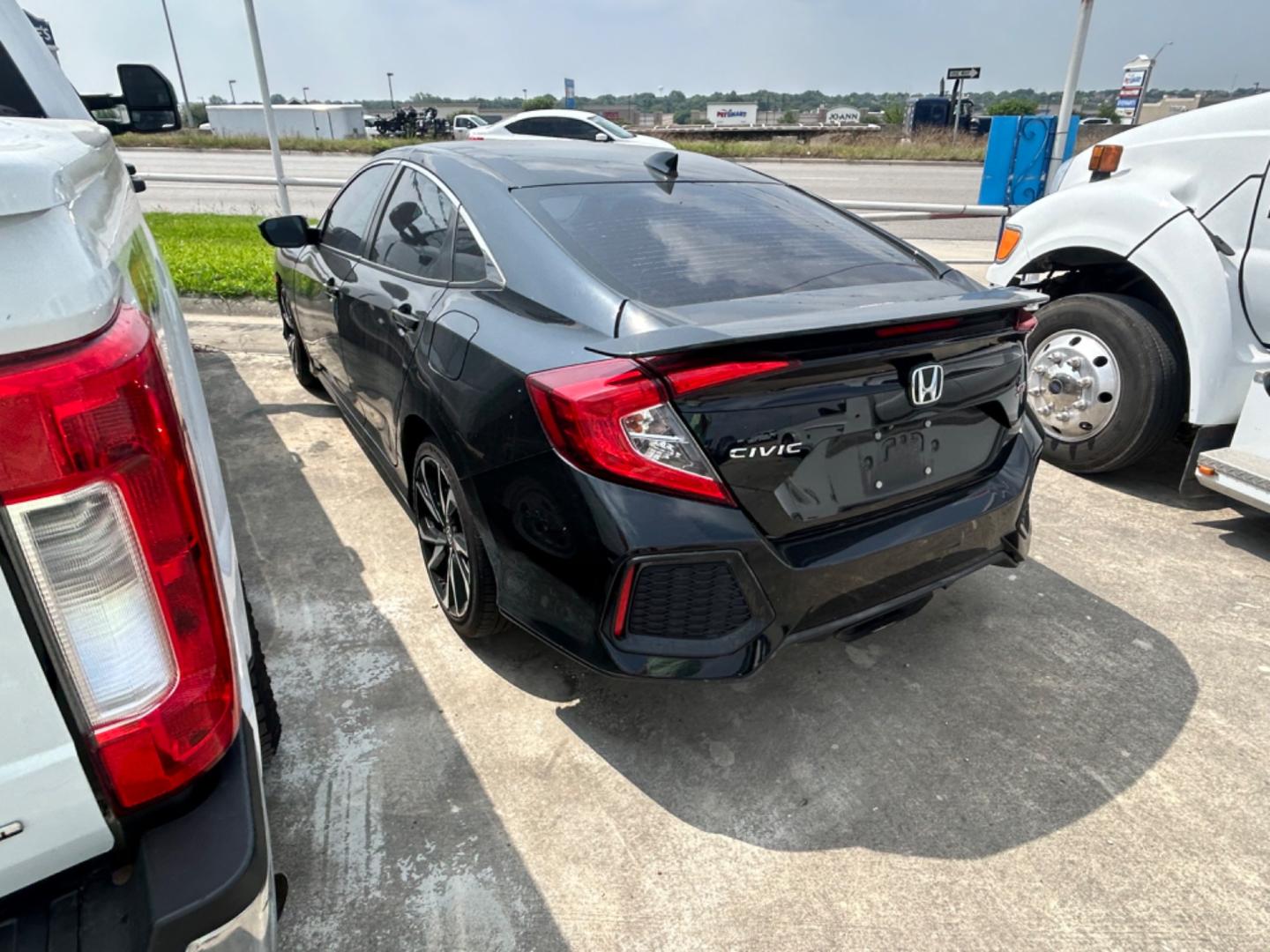 2017 Black Honda Civic Si 4dr Sedan 6M (2HGFC1E52HH) with an 1.5L L4 DOHC 16V TURBO engine, 6M transmission, located at 1687 Business 35 S, New Braunfels, TX, 78130, (830) 625-7159, 29.655487, -98.051491 - Photo#1